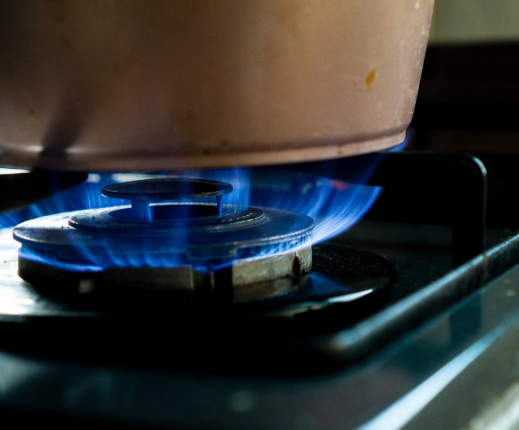 Fire on a gas stove for cooking in the kitchen