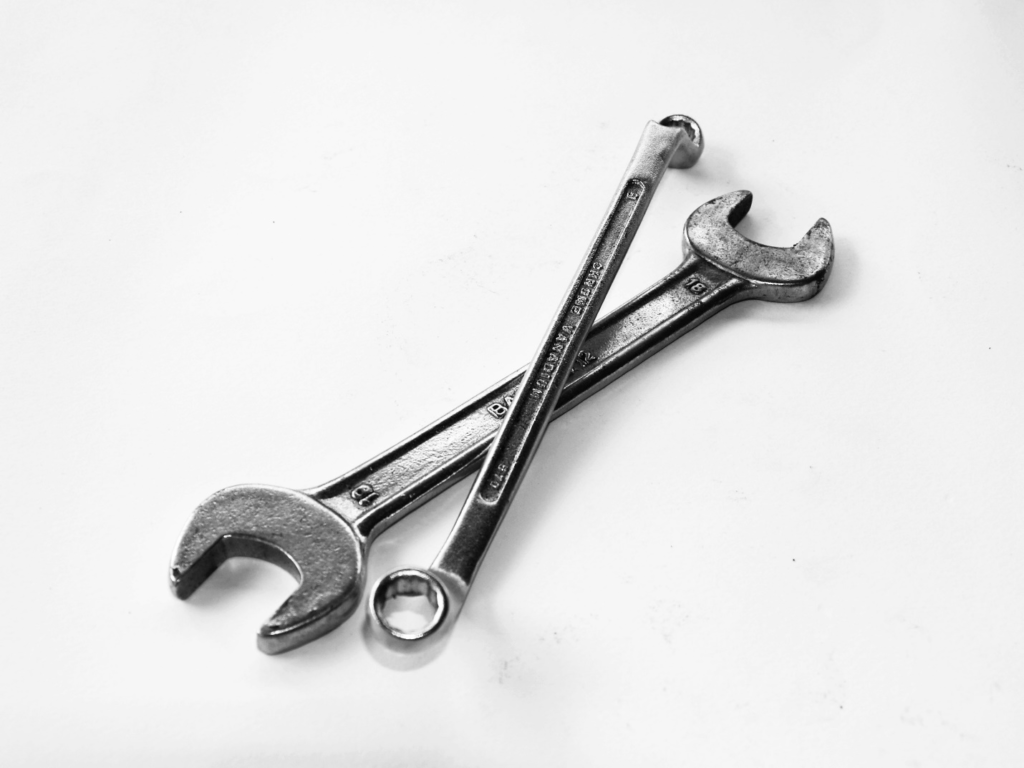 a wrench and spanner on the floor