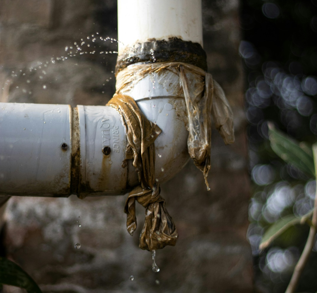 a damaged pipe leaking water