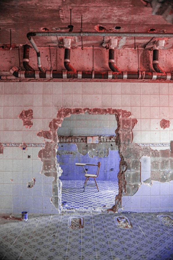 Hole in the wall caused by a water pipe leak in a Germantown home during a plumbing inspection.
