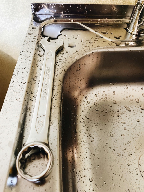A Spanner on a Stainless Steel Sink