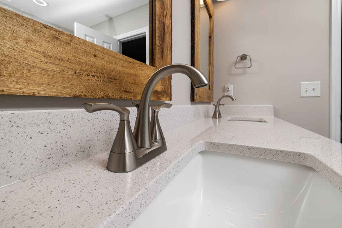 Water pressure, supply line conditions, and faucet efficiency features all play an important role in the long-term performance of a new bathroom fixture.