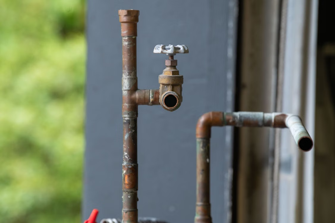 Corrosion and aging pipe material are common causes of the leaks and pressure loss homeowners notice long before a pipe fully fails.