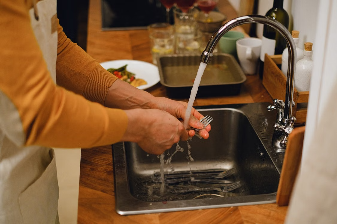 Reaching the faucet mounting hardware can be difficult, especially when removing an older fixture.